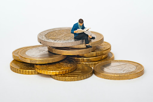 man sitting on money