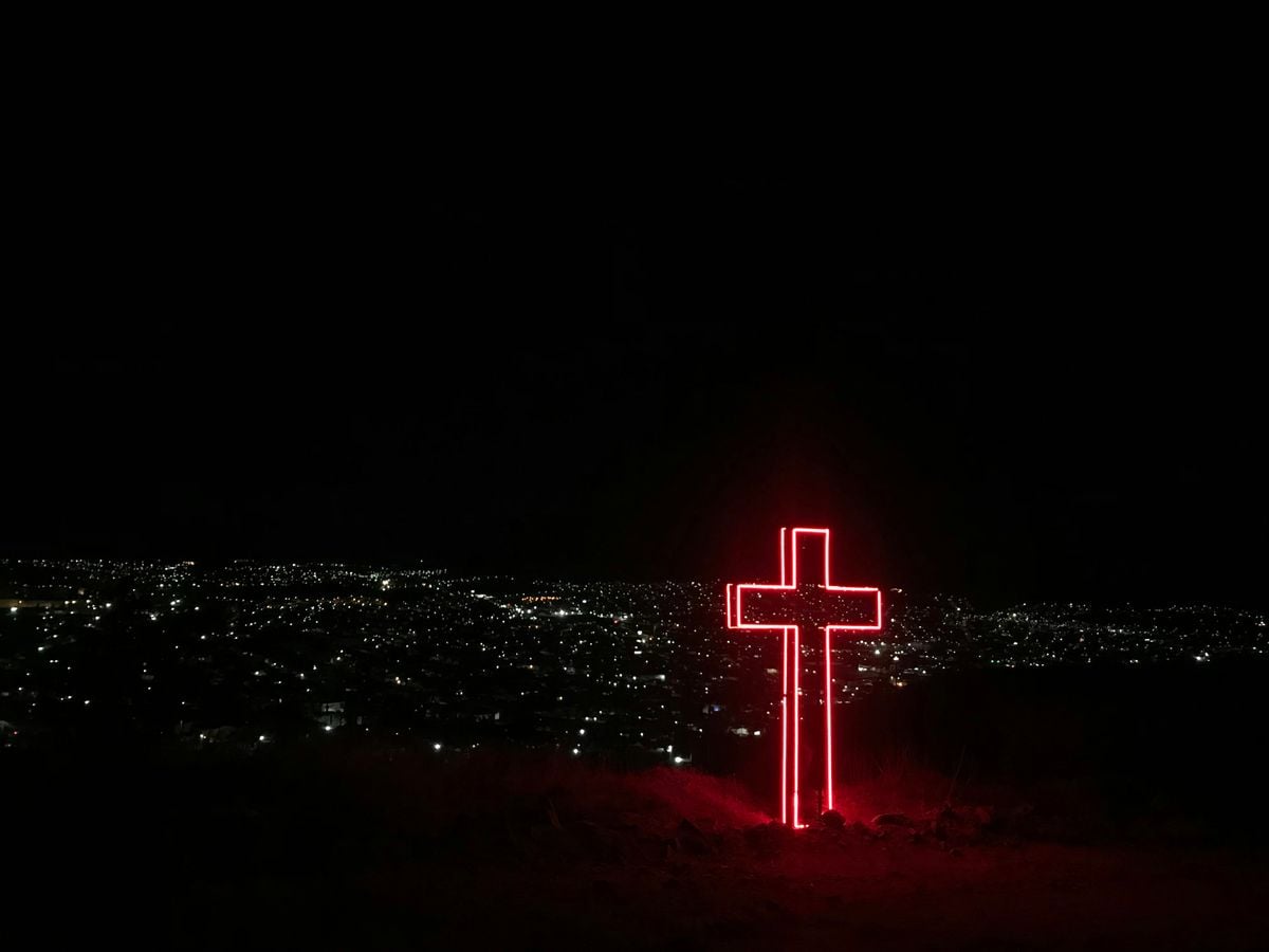 red neon light cross signage