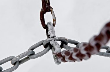 selective focus photograph of gray metal chains