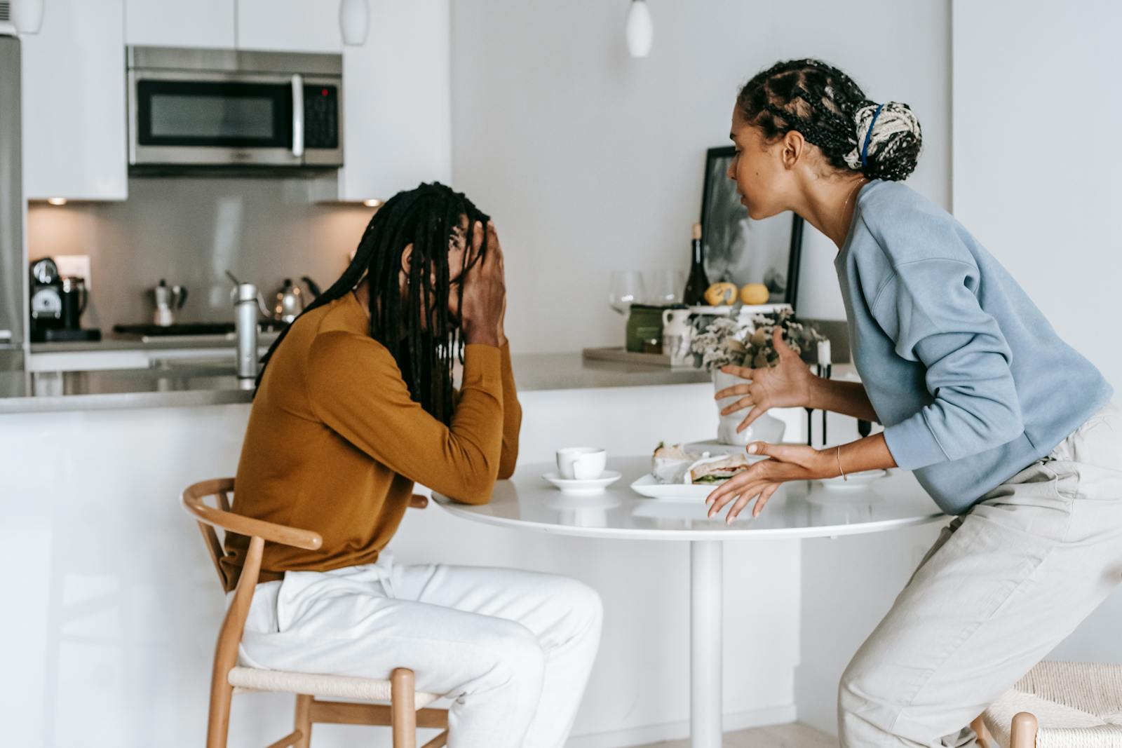 couple kitchen conversation