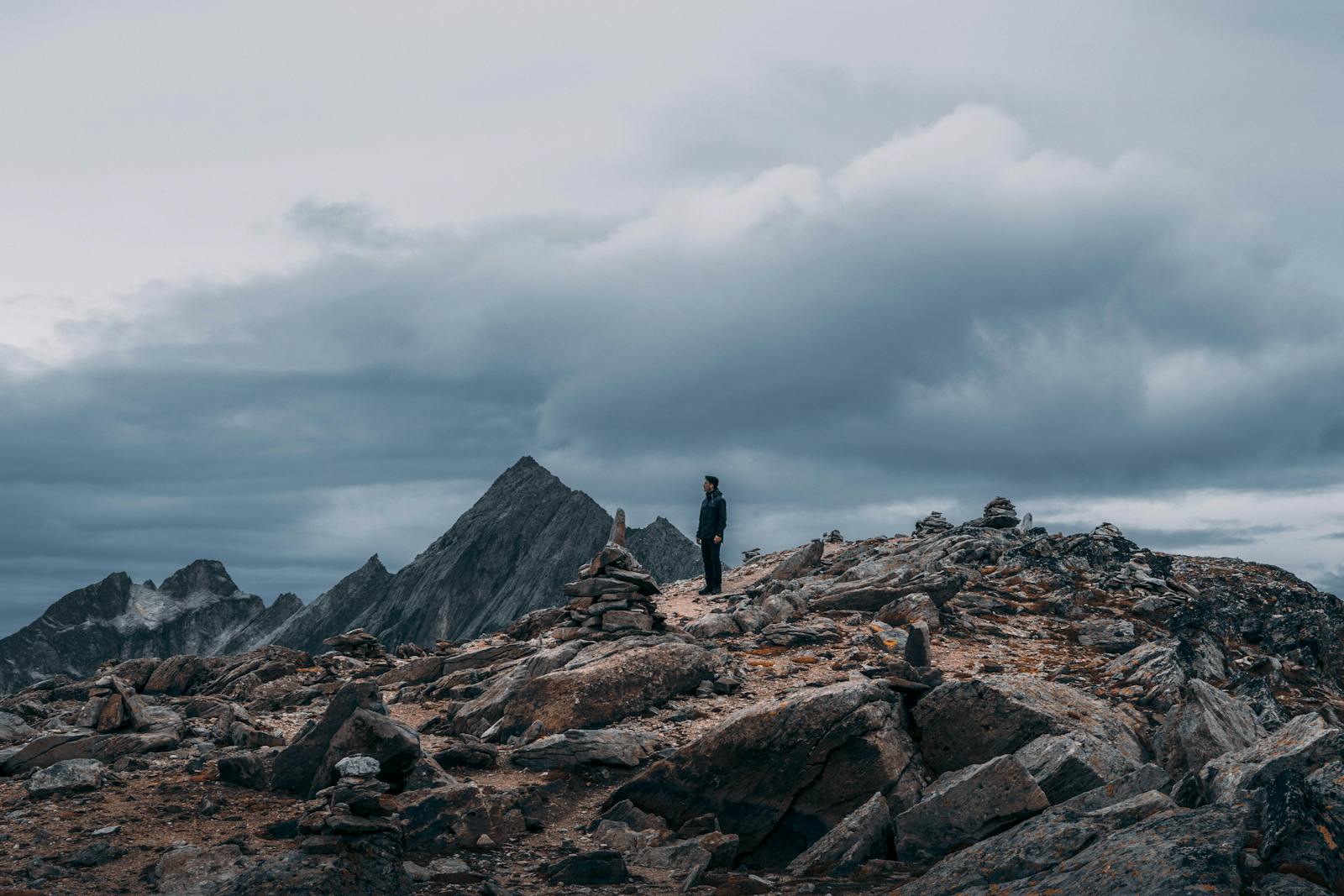 person alone on mountaintop