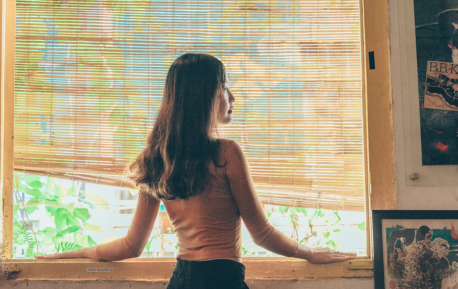 woman alone calm facade