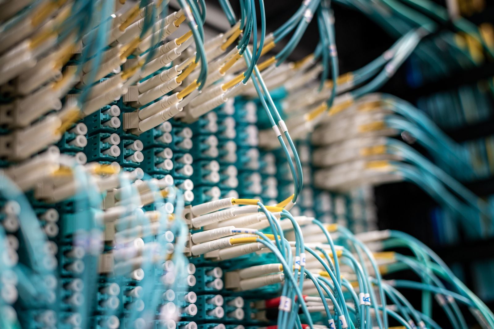 Fiber optic cables connected inside a data center