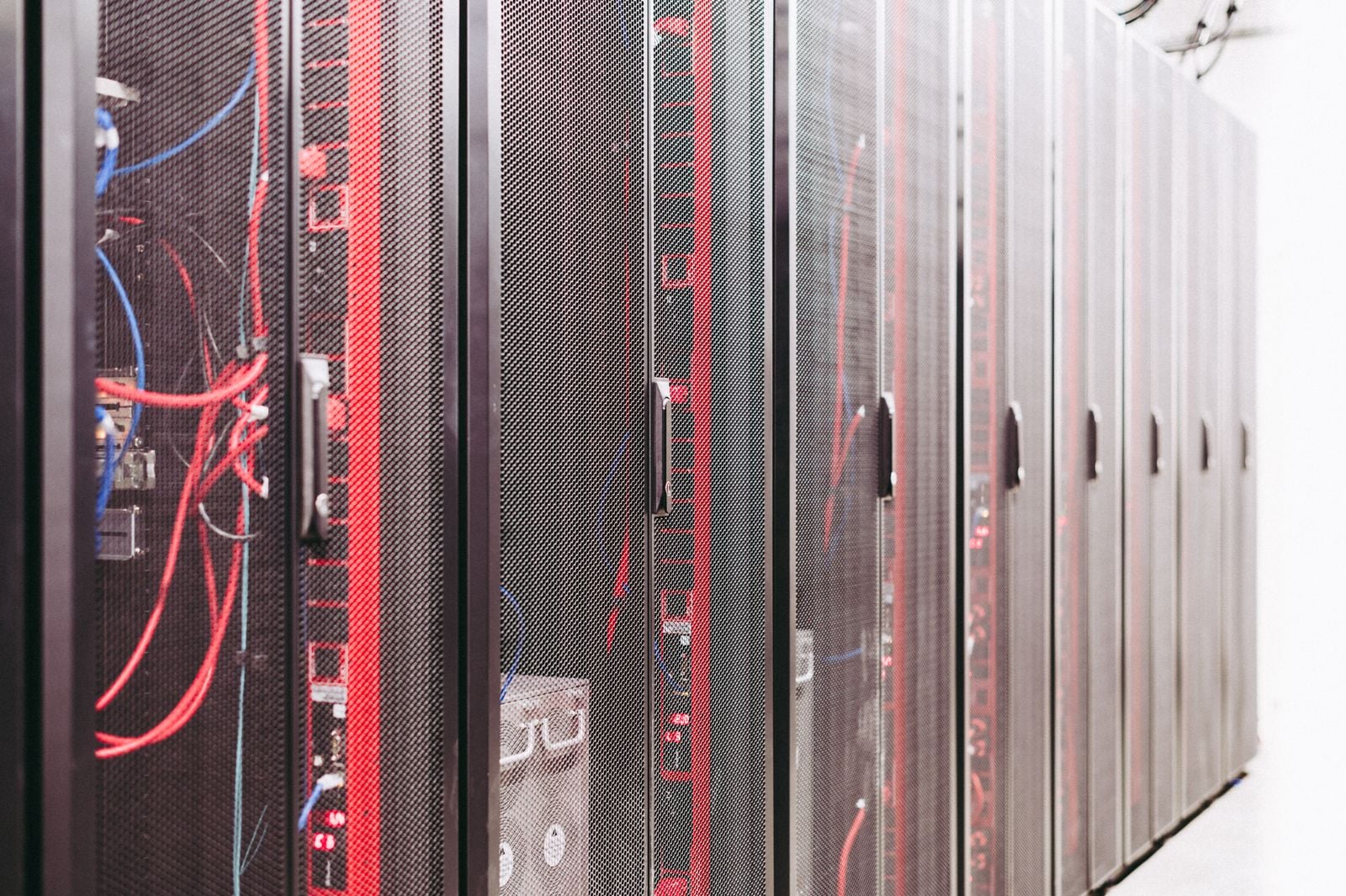 Server racks and cabling inside a data center
