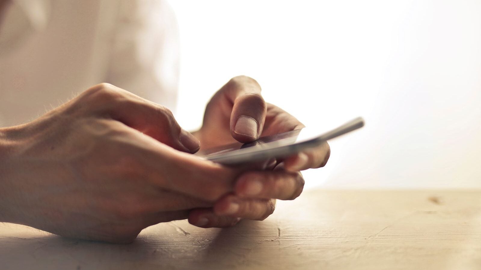 Adults who prefer texting over phone calls often aren't avoidant — they may have grown up in households where tone of voice was the first warning sign of what was coming