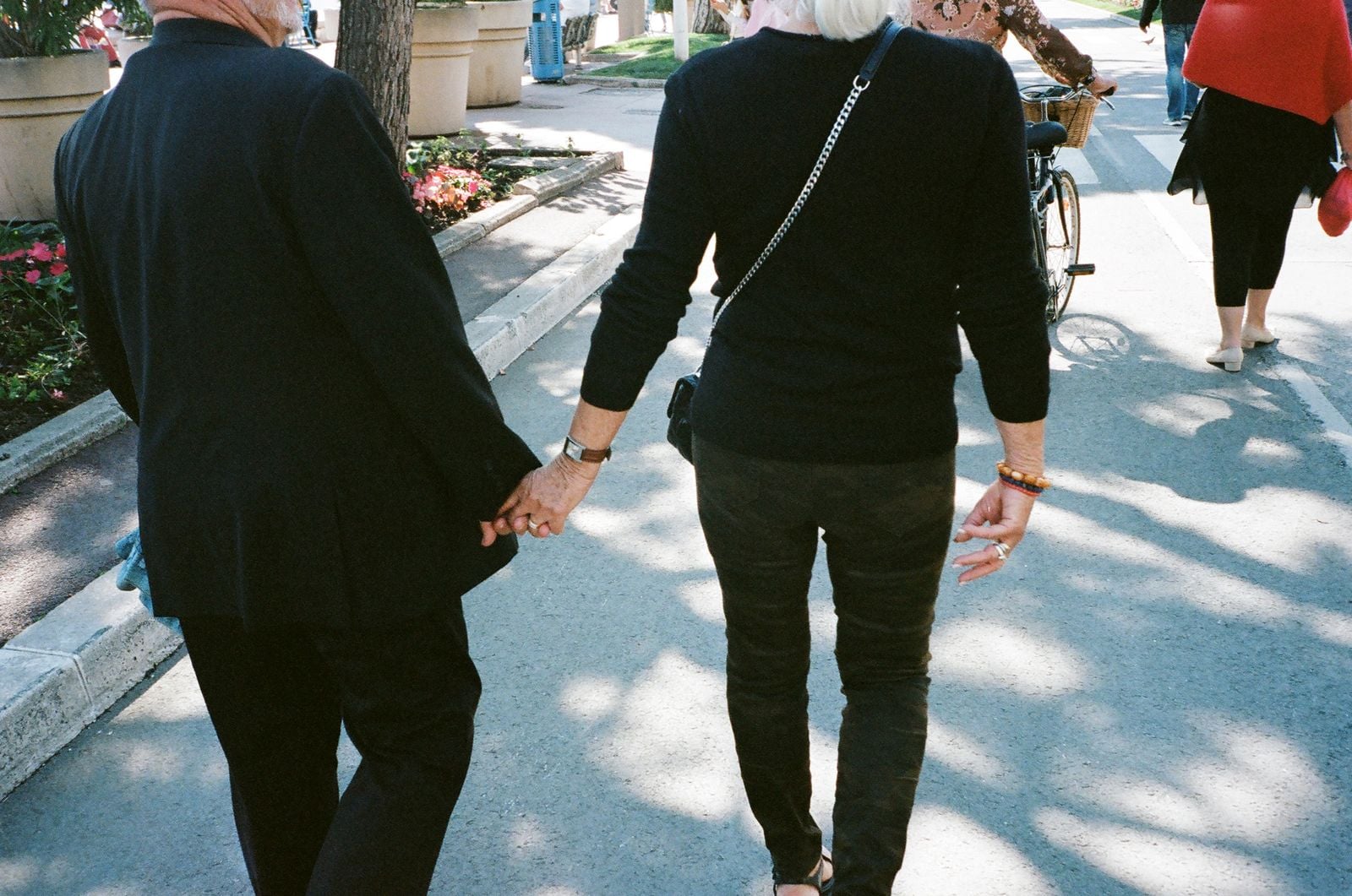 elderly mother daughter hands