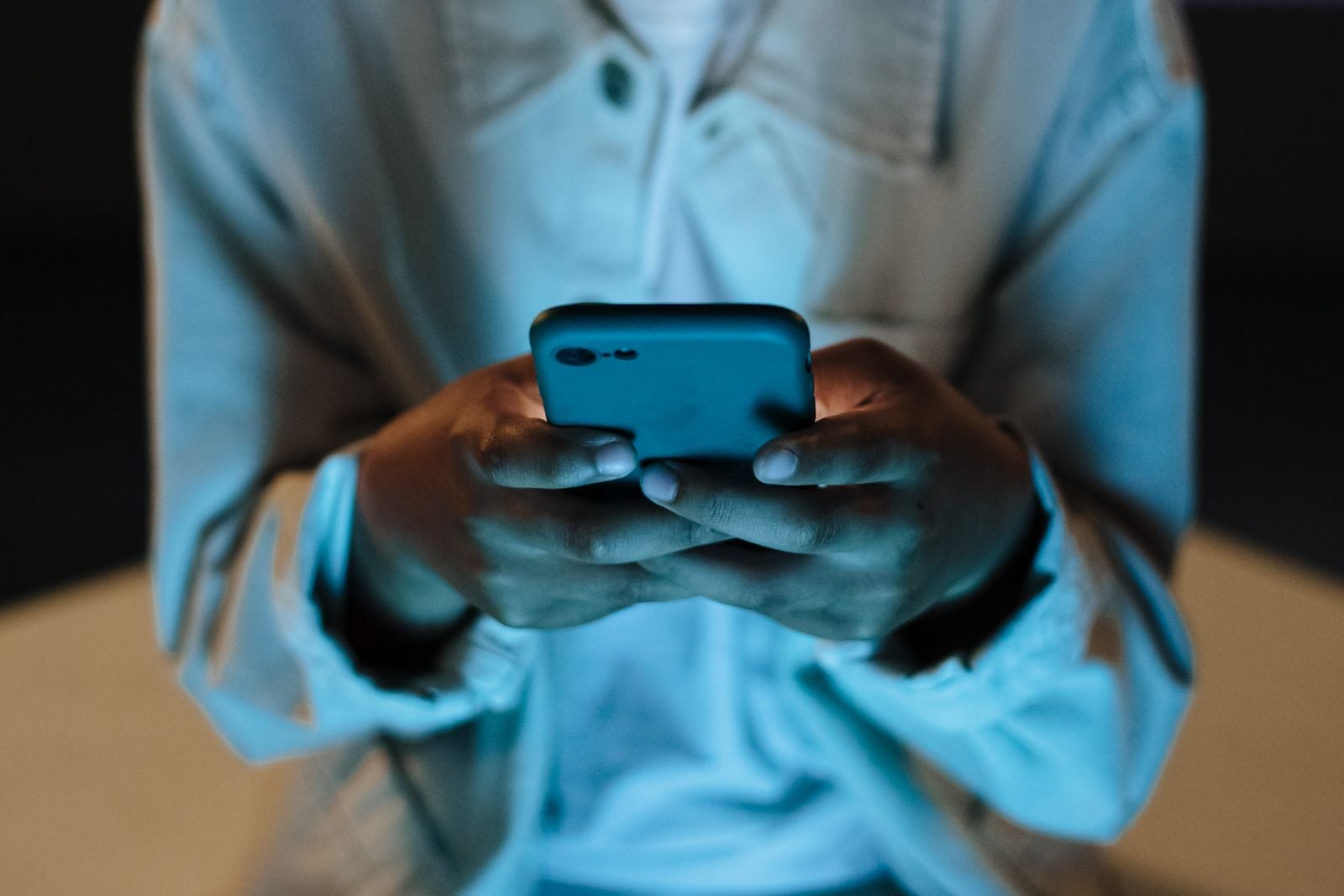 person scrolling phone