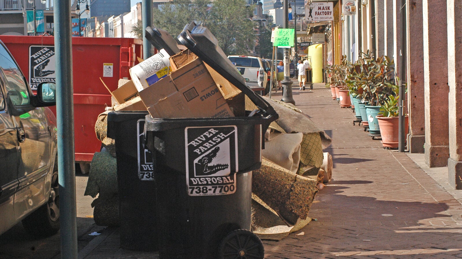 Bags of trash piled along a New Orleans street in October 2005